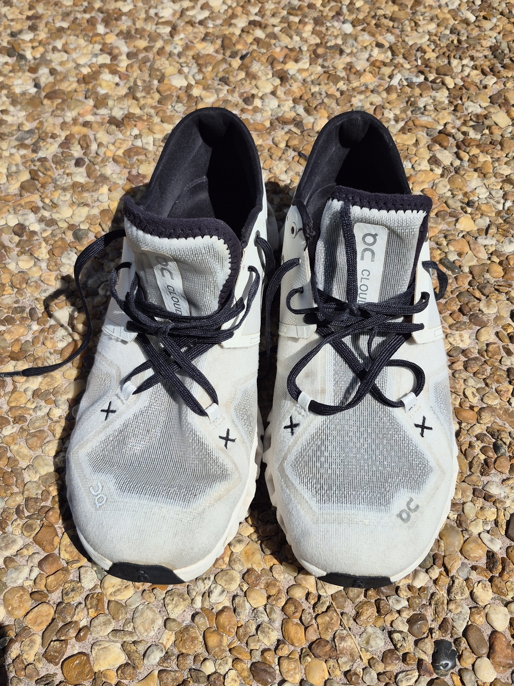 On Running Men’s Cloud Athletic Sneakers in White and Black